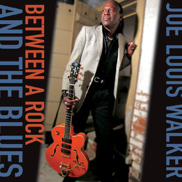 Album cover of Between A Rock And The Blues